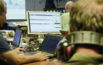Test engineers at desks