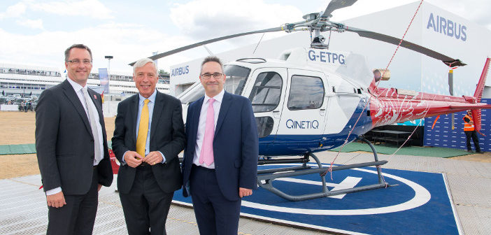 Colin James, managing director of Airbus Helicopters UK (left), Minister of State for Defence, Earl Howe (center) and Nic Anderson, QinetiQ’s managing director, air & space (right)