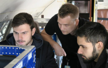 researchers on test flight