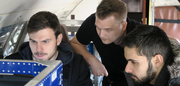 researchers on test flight