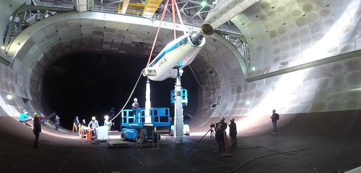 Arnold Engineering Development Complex team members lower the NASA/Army Tiltrotor Test Rig into the 40- by 80-ft wind tunnel in the AEDC National Full-Scale Aerodynamics Complex at Moffett Field in Mountain View, California