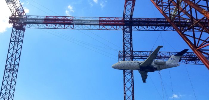 The Fokker F-28 hangs from a gantry at NASA’s Langley Research Center in Hampton Virginia, before it is dropped