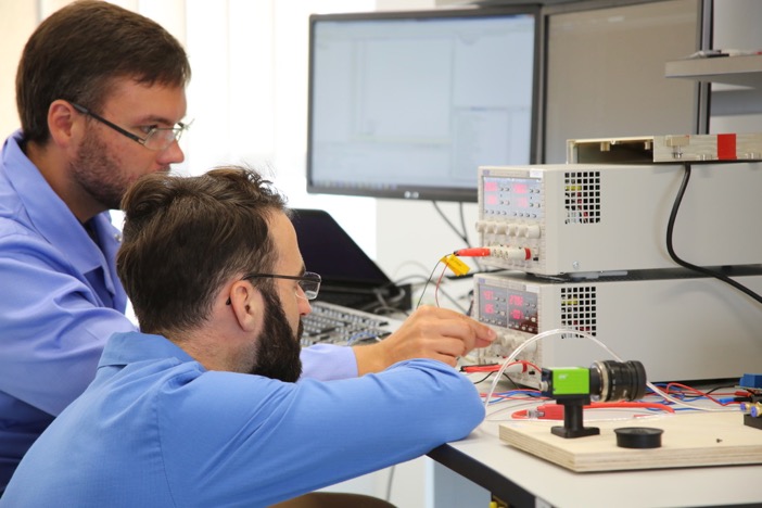 Engineers at work in the Engineering Design Centre’s Avionics and Digital Systems Laboratory