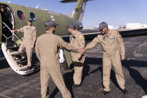 Senior Test Pilot Peter Gracey (right) and Chief Test Pilot Dustin Smisor celebrate with colleagues after the Denali prototype’s successful first flight