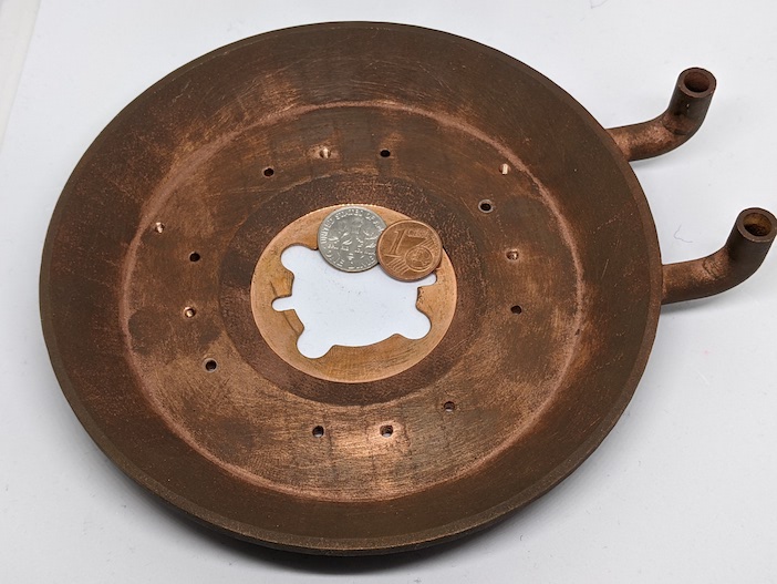 This additive manufactured cooling pan made of copper was used to Comet Yxlon's latest X-ray scanning technology