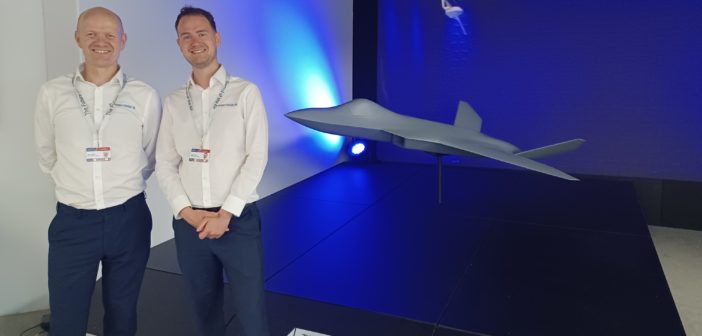 Dr Mike Roberts and David Penny (Design Engineer) in front of the Team Tempest stand at the BAE Systems Charter for Farnborough Air Show (Photo: Slipstream)