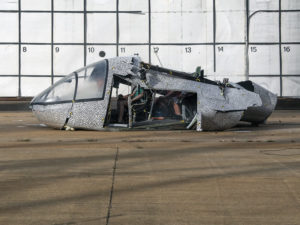 The RVLT Lift+Cruise Model rests on the ground after suffering a devastating crash. Tests like these enable researchers to understand how a vehicle's structure reacts to a crash. Credits: Dave Bowman