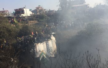 Rescue teams working near the wreckage of Yeti Airlines ATR72 aircraft in Pokhara. EPA/Krishna Mani Baral