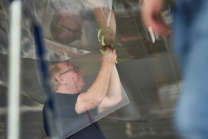 Sharkskin materials being applied