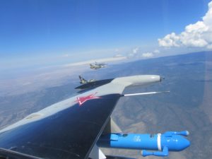 The Angry Kitten pod (blue) in early flight testing on the wing of an L-39 Albatross in 2013 (Credit: Stan Sutphin/Georgia Tech)