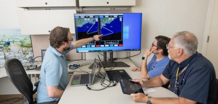 working on a flight plan at a computer